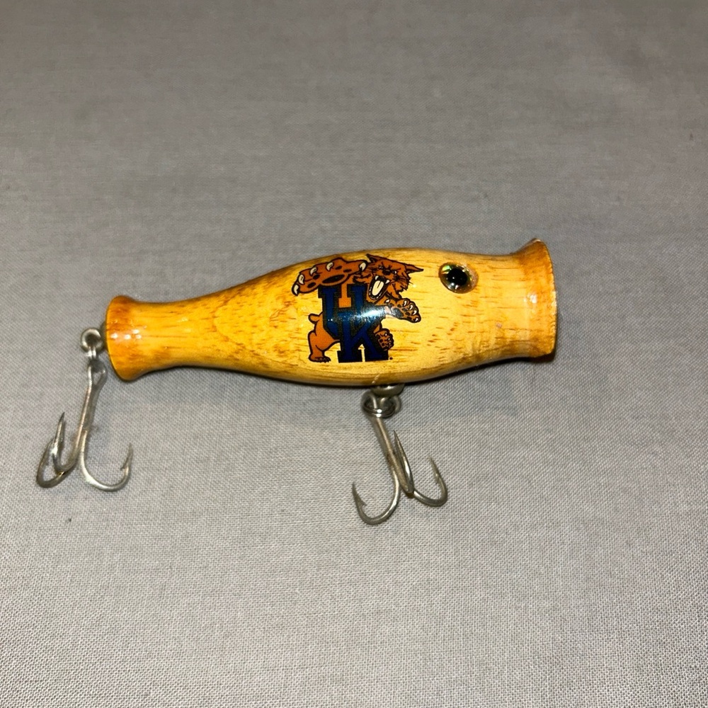 Handmade wooden UK Wildcats fishing lure.